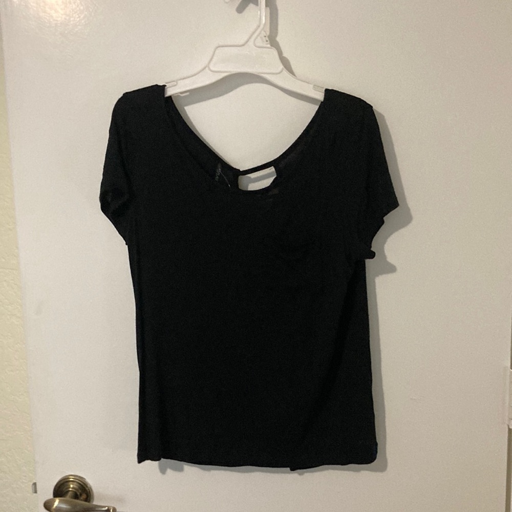 Plain black blouse with design on the back